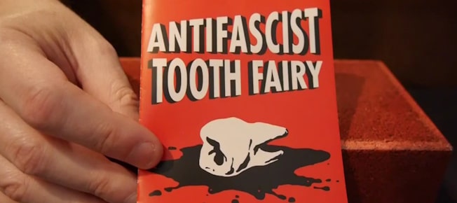 Throw hands, collect teeth, defend your community with the dexterity game Antifascist Tooth Fairy - Graphic Policy Throw hands, collect teeth, defend your community with the dexterity game Antifascist Tooth Fairy - Graphic Policy